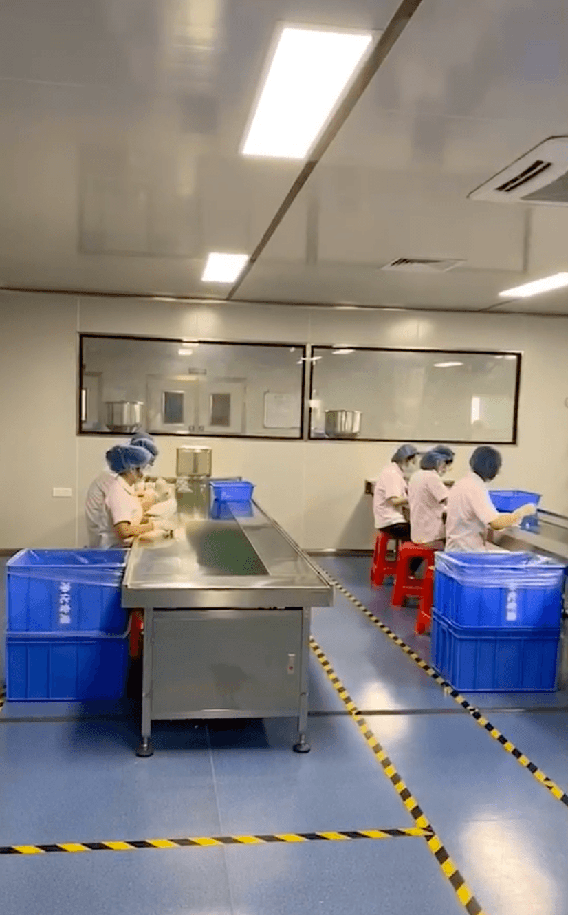 Production line with automated filling and packaging machines – ensuring consistent quality and efficiency.